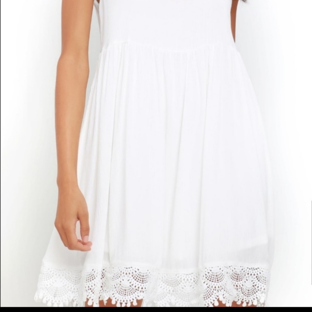 Flowy White Spaghetti Strap Dress With Lace Hem